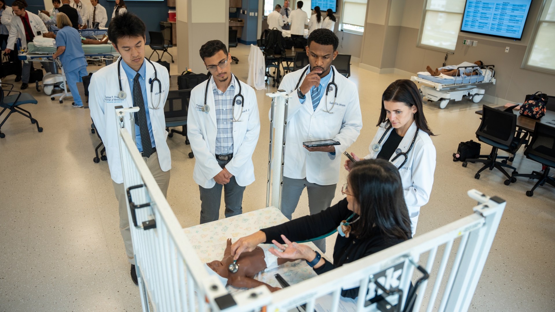 The first medical students at Belmont University's Frist College of Medicine participate in a pediatric clinic.