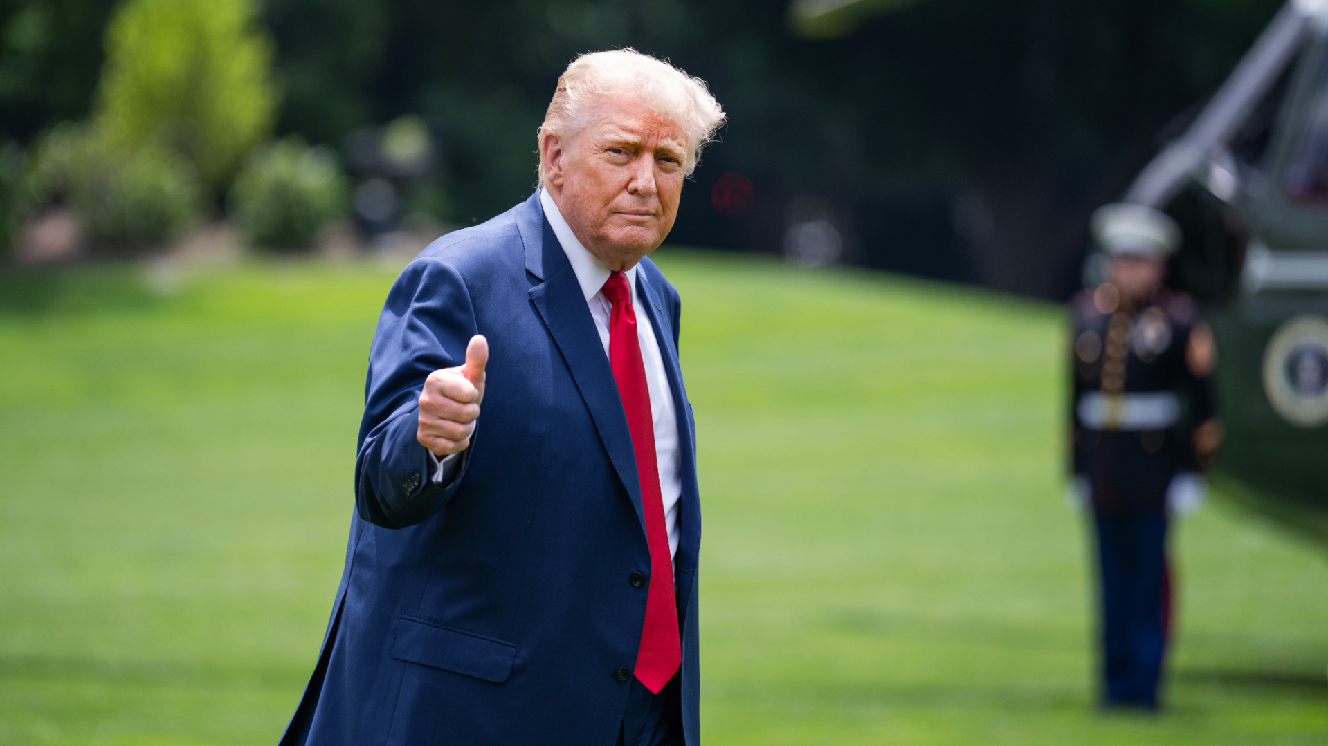 Donald Trump thumbs up walking