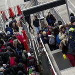 Asylum seekers arrive in Sweden.