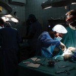 Surgeons operate in a pediatric ward in Benin.